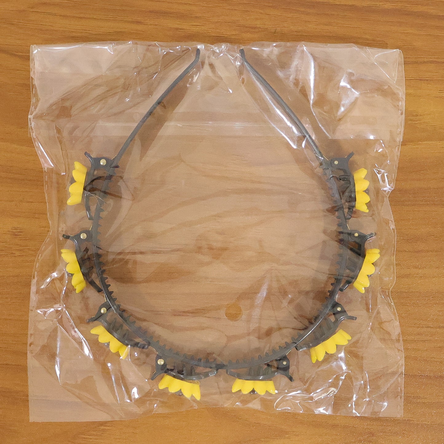 Wukusy sunflower floral clip hair band with yellow sunflower design, decorative hair accessory on a white background