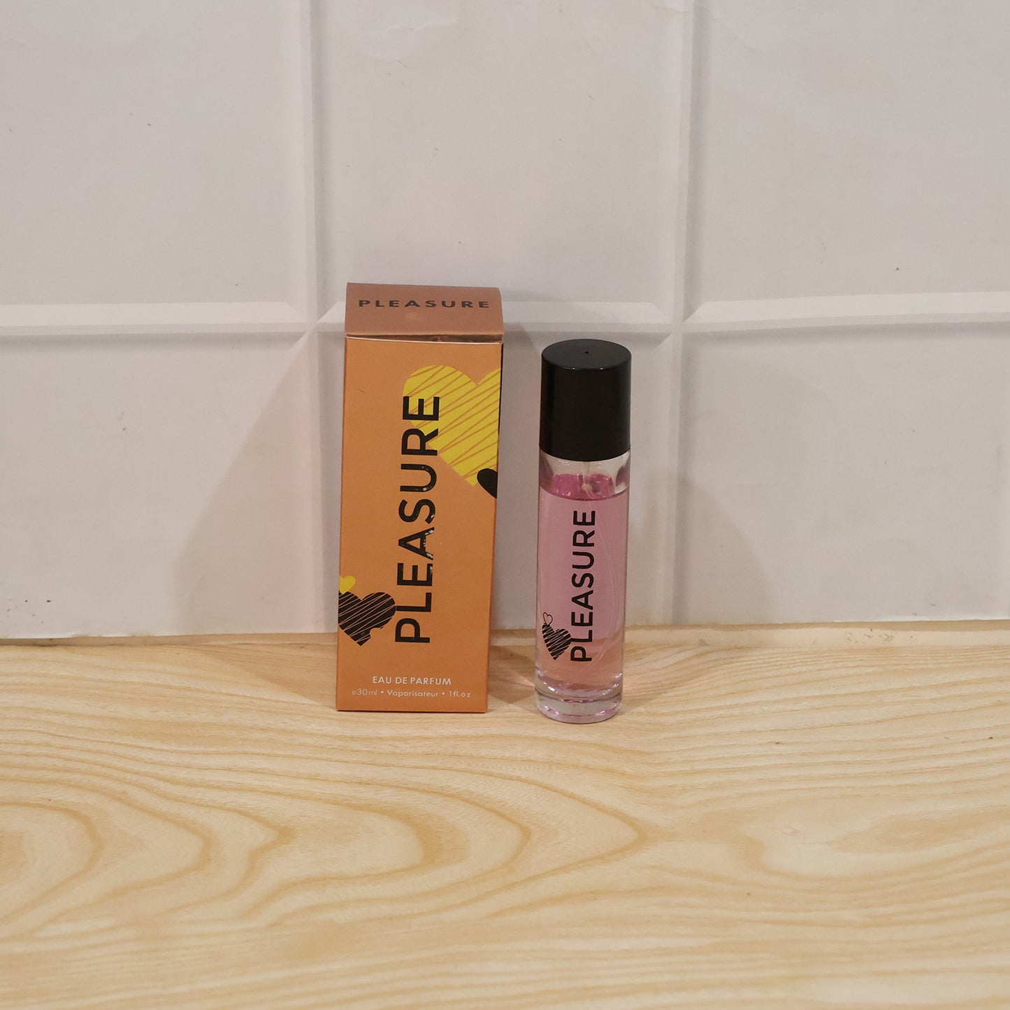 Wukusy Pleasure Eau De Parfum spray bottle, 30ml, with elegant packaging and a sleek design.
