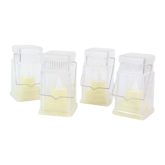 Set of four Wukusy LED flameless lantern-style decorative candles for home decor, featuring warm, flickering light effects.