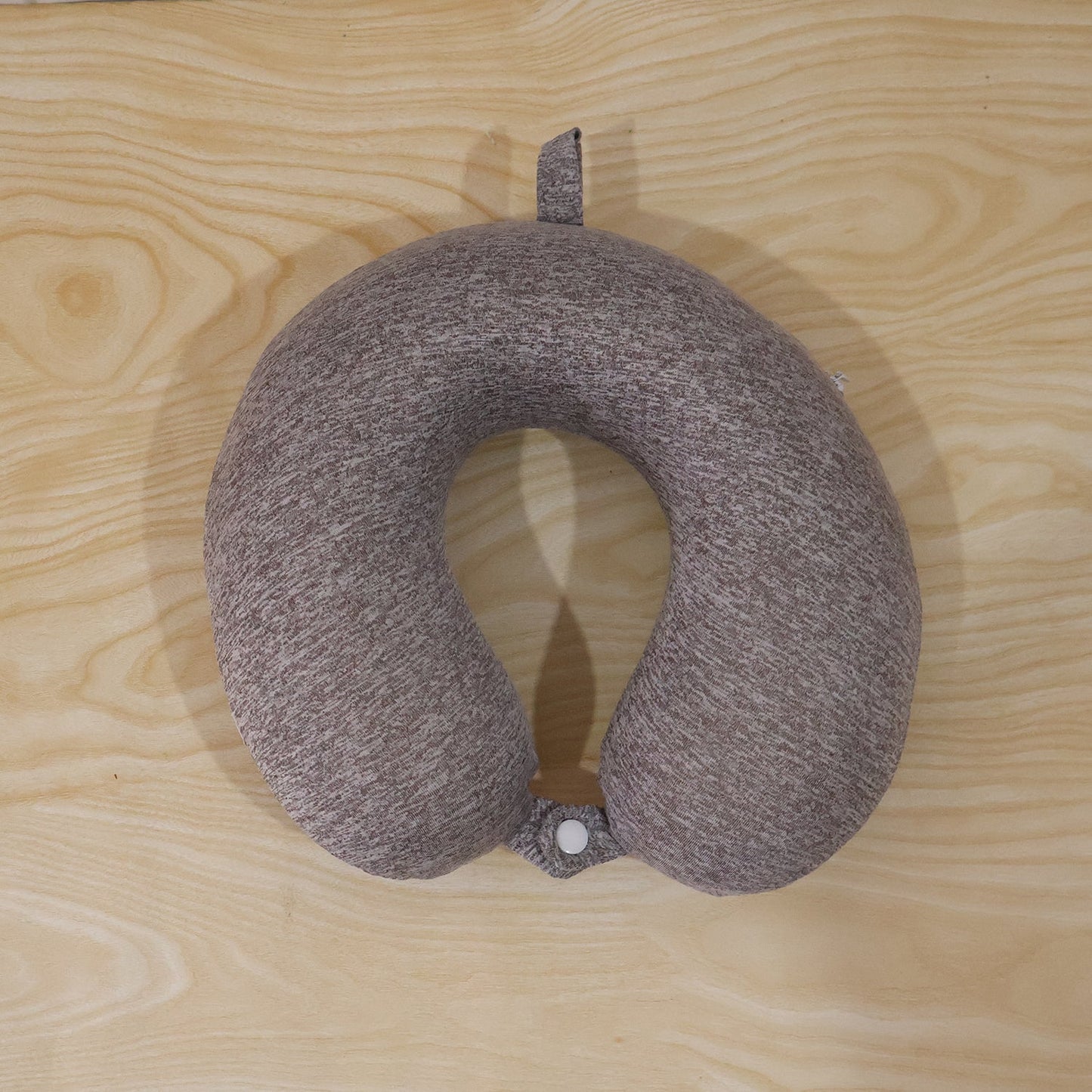 Grey melange U-shaped travel neck pillow by Wukusy with soft support for head and neck comfort.
