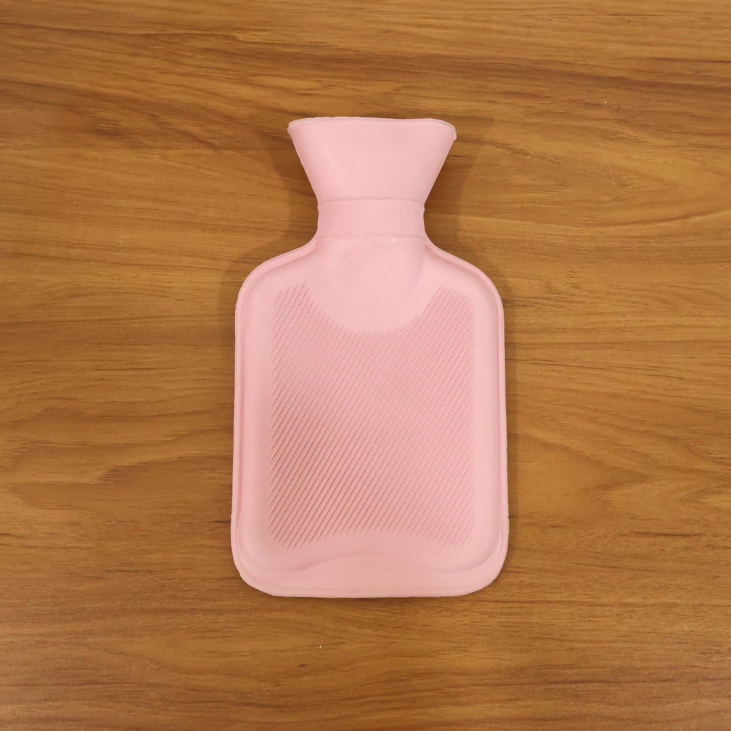 Wukusy reusable hot water bag for pain relief, soft fabric cover, showing a filled hot water bag ready for warm compress therapy.