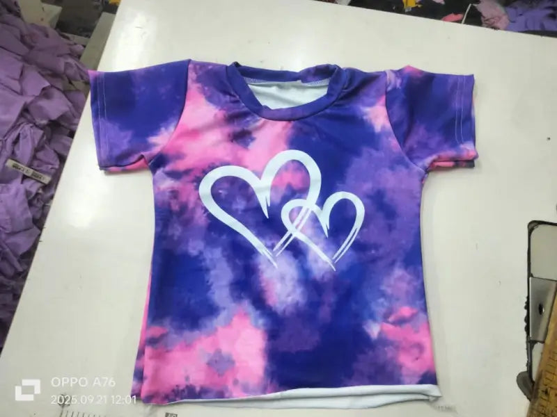 Kids tie-dye heart print summer set with purple and pink T-shirt and shorts from ekom, perfect for warm weather.