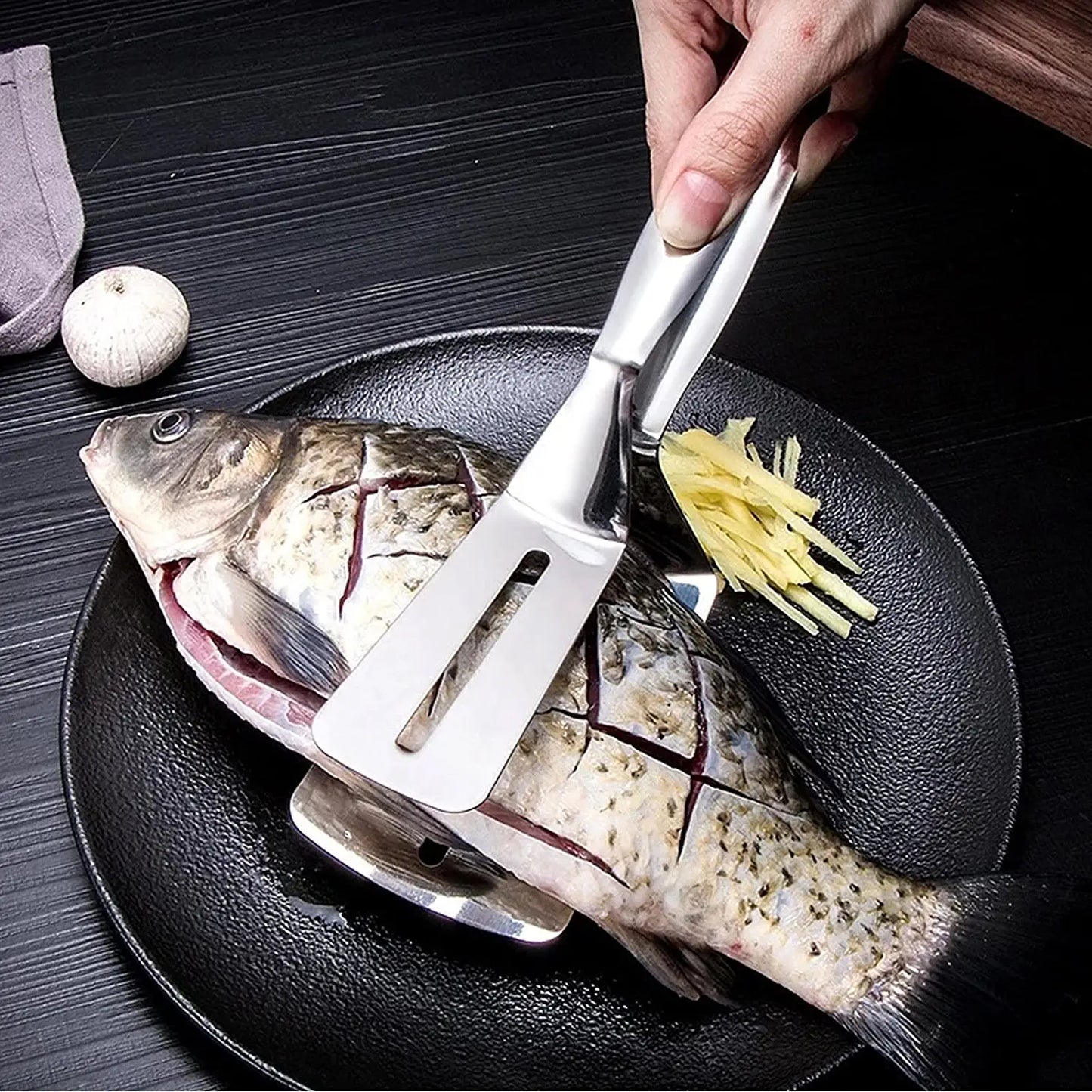 Wukusy 2918 multifunction kitchen tong with stainless steel handle, ideal for flipping, serving, and grilling food like steaks and BBQ.