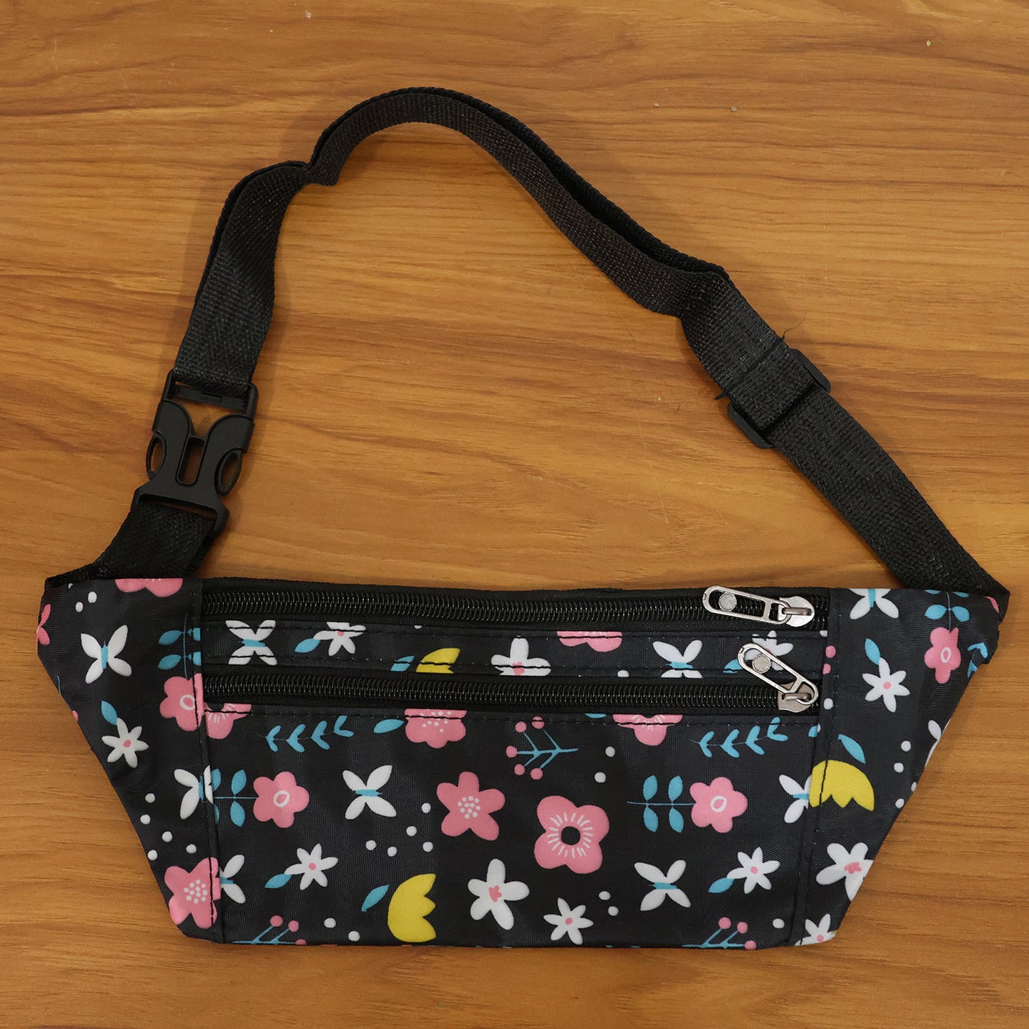 Wukusy floral print adjustable waist bag with zipper closure, stylish fanny pack worn around the waist, suitable for casual wear