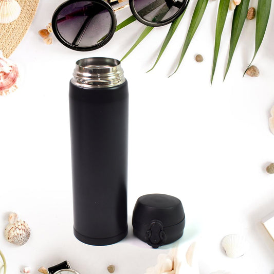 Insulated stainless steel water bottle for kids in mixed colors, 500ml capacity by Wukusy, durable and leak-proof for children.