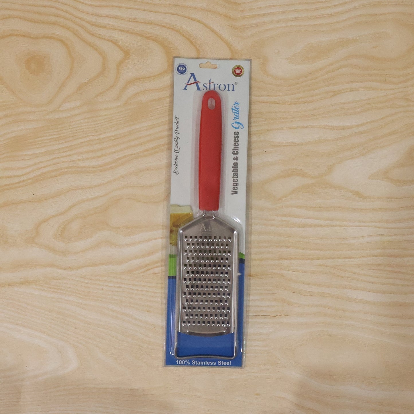 Wukusy handheld cheese grater with plastic handle, ideal for zesting vegetables and lemons, shown with grated zest.