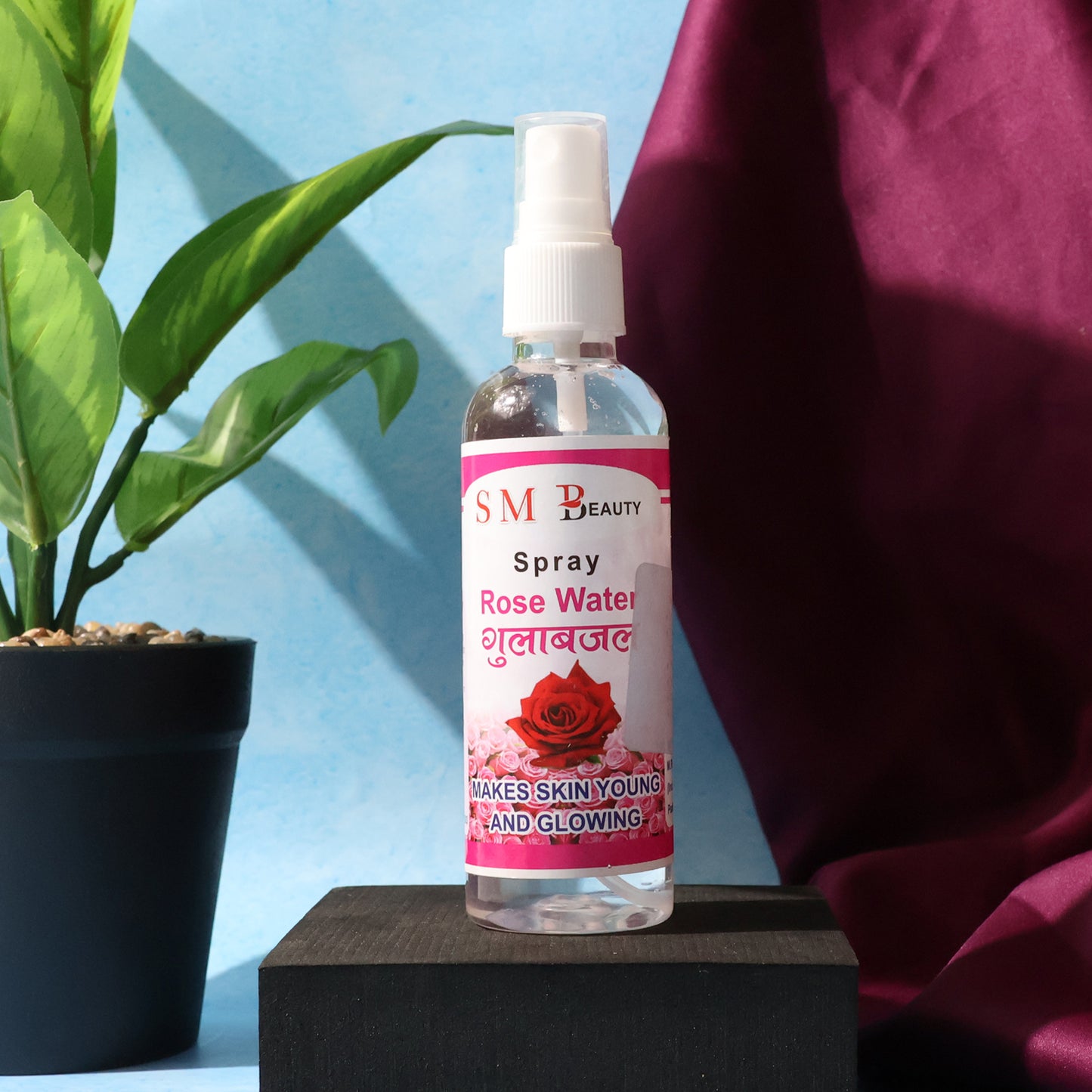 Wukusy rose water spray for face, 100ml, hydrating skin with natural rose water in a spray bottle.