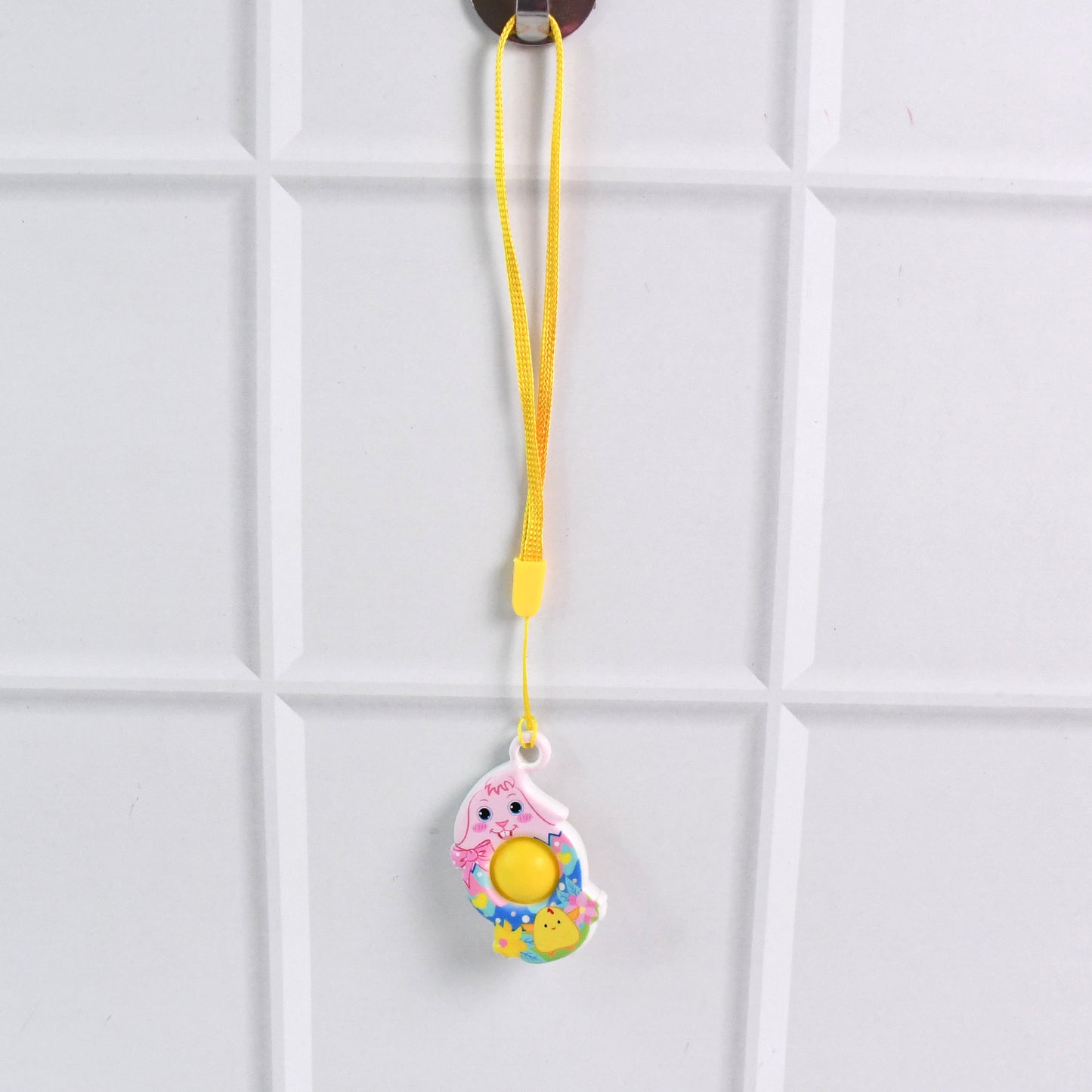 Wukusy mini cartoon chick-shaped push pop fidget toy with hanging strap, colorful and playful for stress relief and sensory fun.