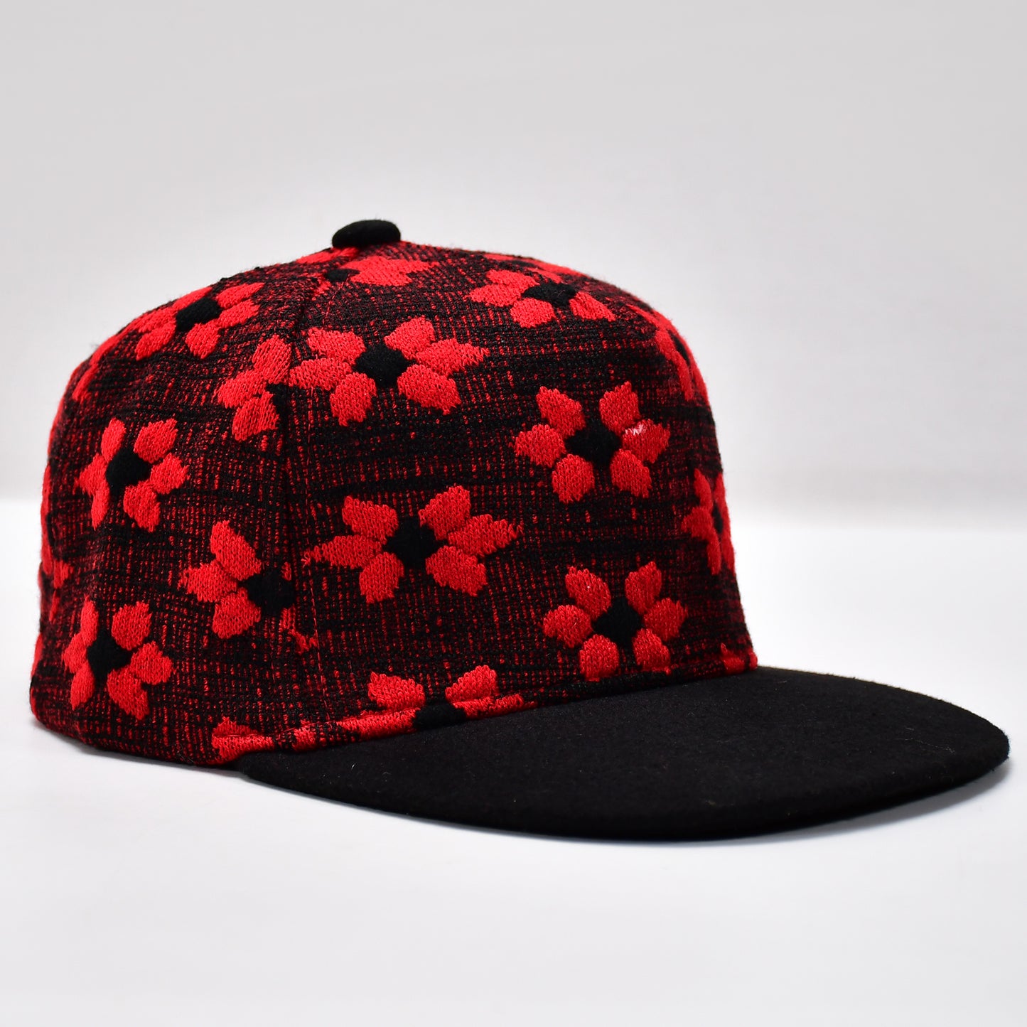 Wukusy classic black snapback hat with flat brim, adjustable strap, hip hop style, featuring bold branding and modern streetwear design.