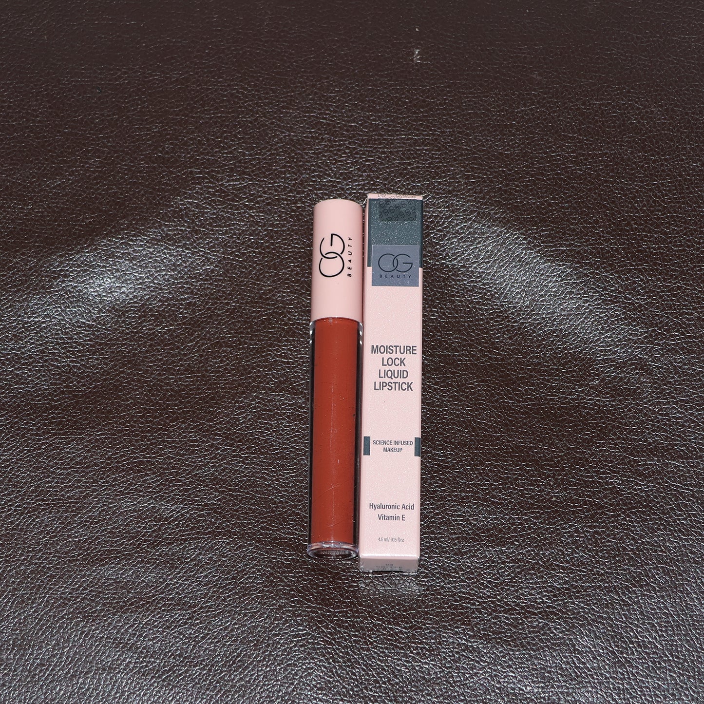 Wukusy OG Beauty Coffee Cuddle Moisture Lock Liquid Lipstick in 4.5 ml, showcasing the sleek tube and applicator.