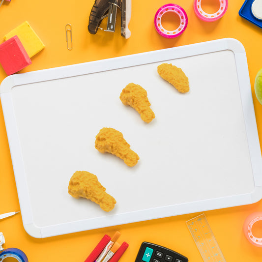 Set of 8 Wukusy chicken wing and chicken leg rubber erasers, fun school supplies for kids and students, ideal for office and art use.