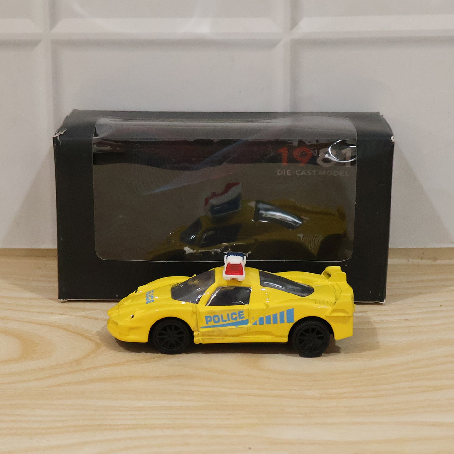 Wukusy police design mini toy car with pull-back friction mechanism for kids, featuring a detailed police car model.