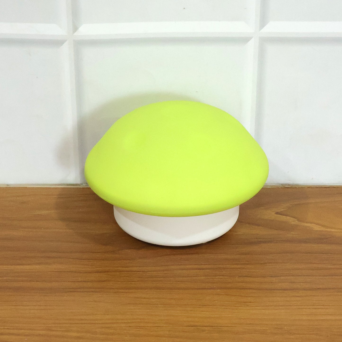 Wukusy cute mushroom-shaped LED night lamp glowing softly in a child's bedroom for cozy lighting and decorative ambiance.