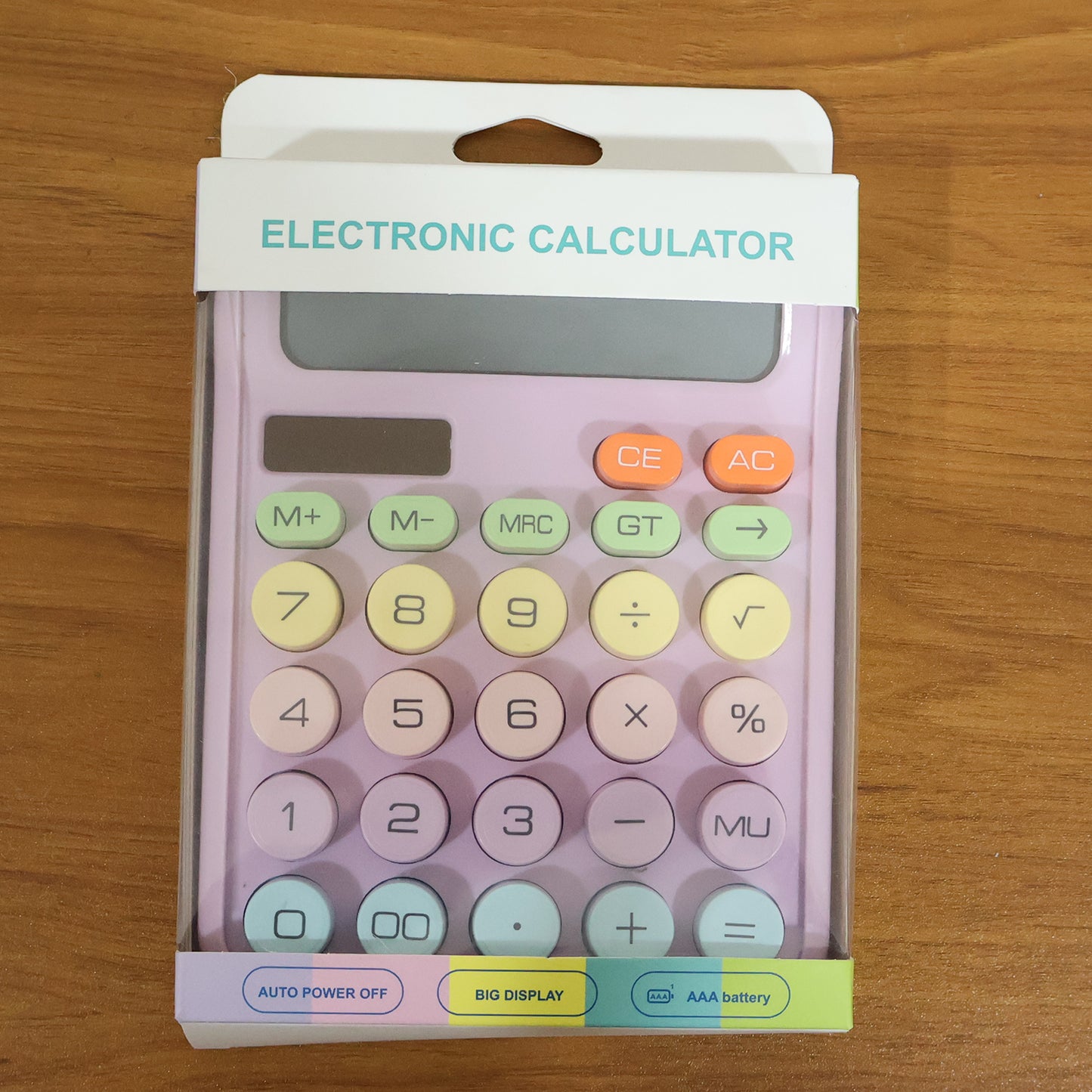 Wukusy electronic desktop calculator with numeric keypad and display screen showing calculations.