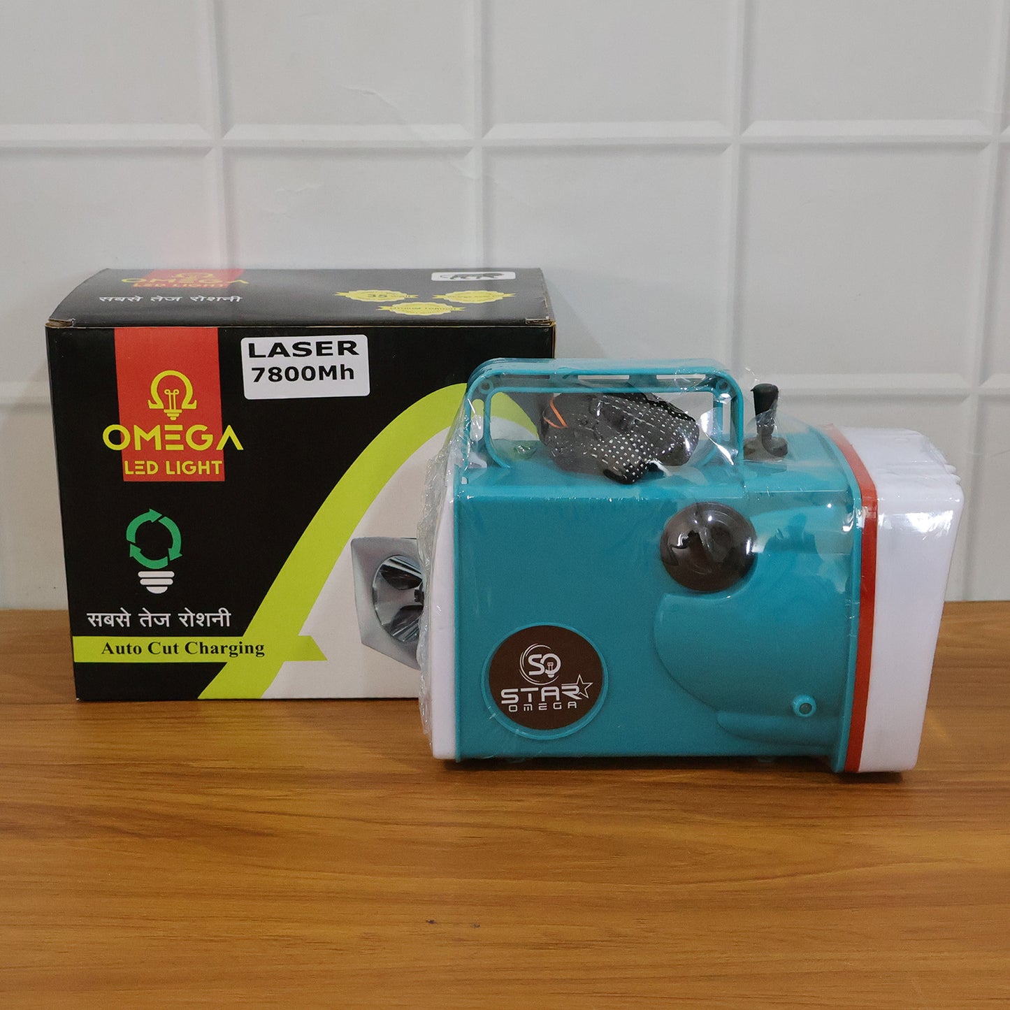 Wukusy Omega rechargeable 7800mAh LED laser torch light with focused beam and ergonomic design, suitable for outdoor use.