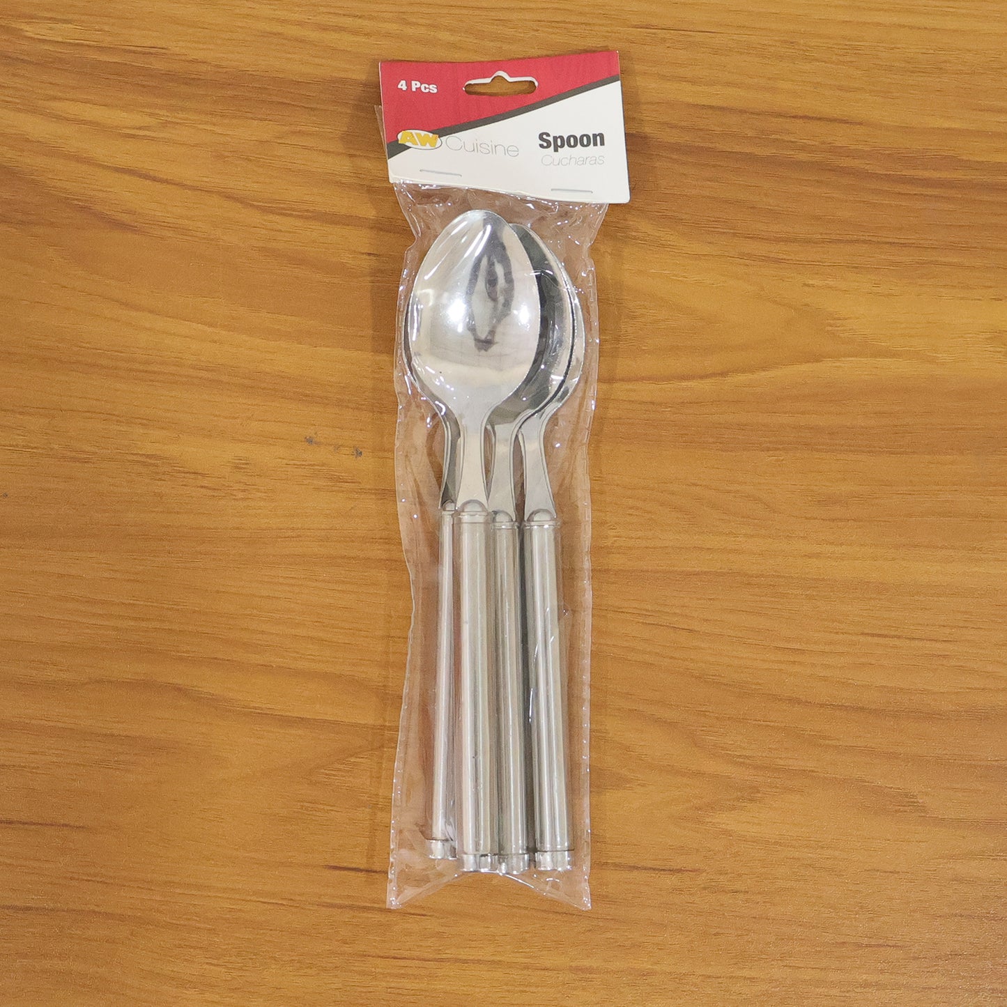 Set of four stainless steel dinner spoons by Wukusy, showing shiny, polished surface and ergonomic handles on a plain background.
