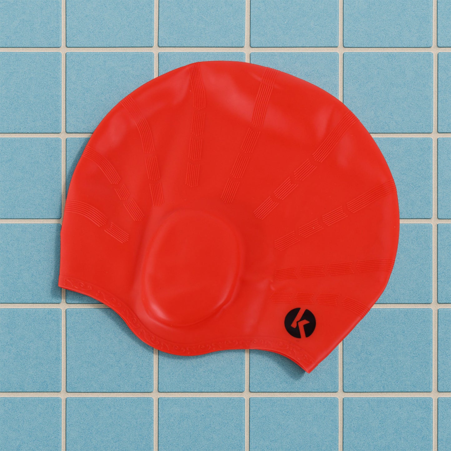 Wukusy professional silicone swimming cap in vibrant blue, designed for water sports and swim training.