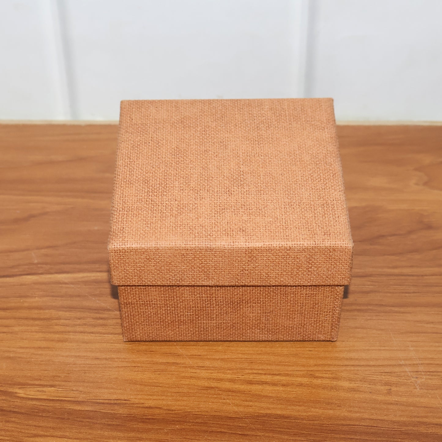 Wukusy multi-purpose storage gift box, 9.6 cm size, with a decorative design, ideal for organizing small gifts or jewelry.