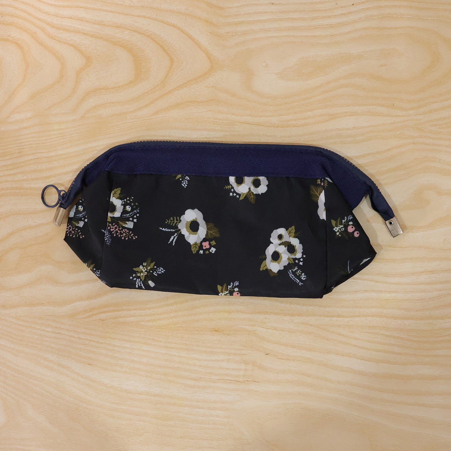 Wukusy stylish multipurpose cosmetic storage pouch bag, 18x12 cm, with a sleek design and multiple compartments for makeup and toiletries.
