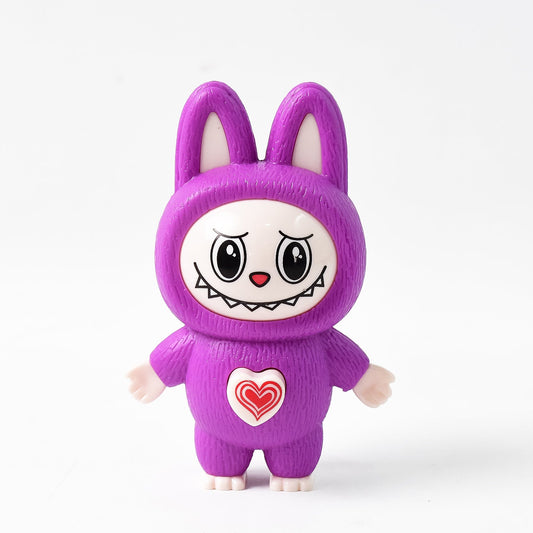 Wukusy cartoon character face-changing toy with key holder and keychain, featuring colorful character face and playful design.