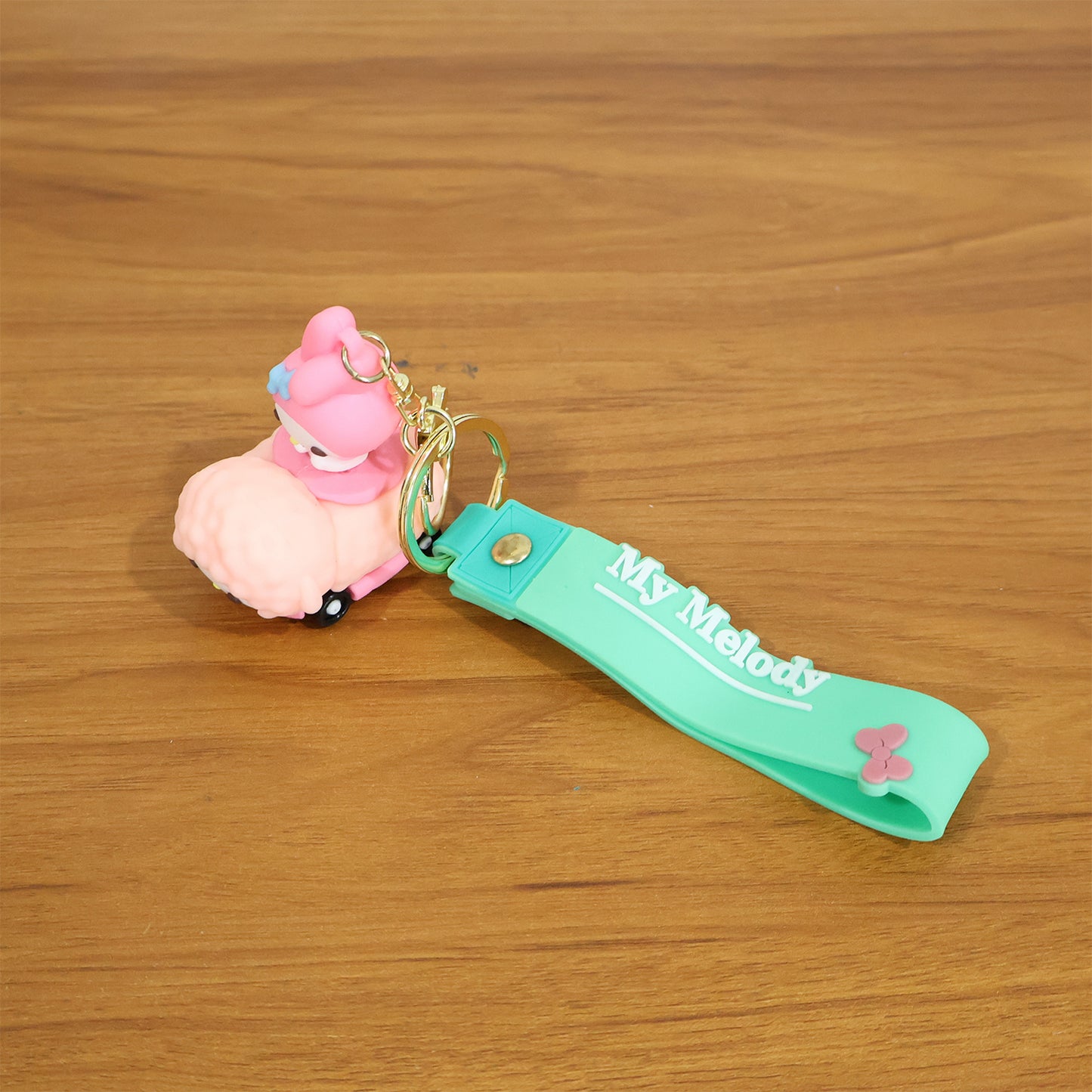 Colorful cartoon character silicone keychain by Wukusy featuring a cute, playful design on a keyring.