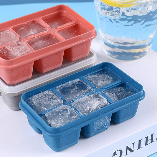 Wukusy 6-grid silicone ice tray with water in molds, used for making ice cubes in household kitchens and food preparation.