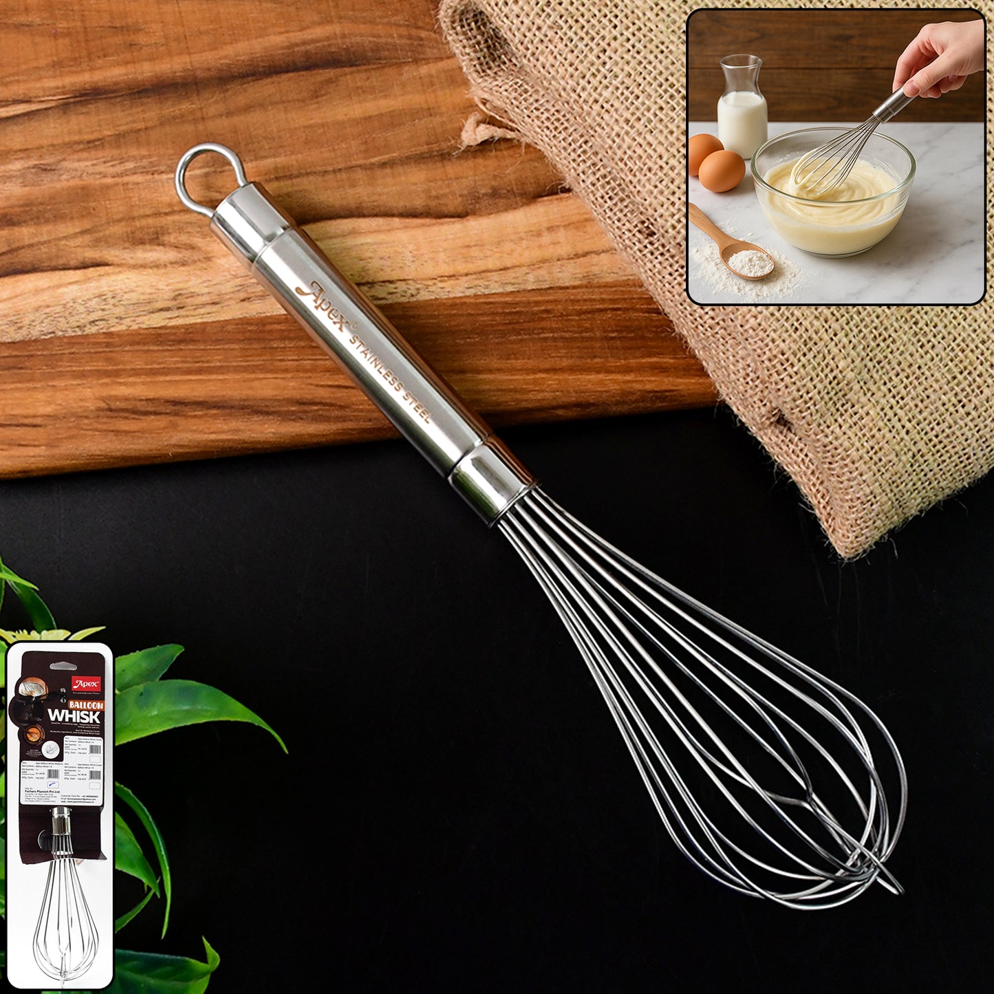Wukusy Apex stainless steel large hand whisk for baking and cooking, with a sturdy handle and multiple wire loops for mixing.