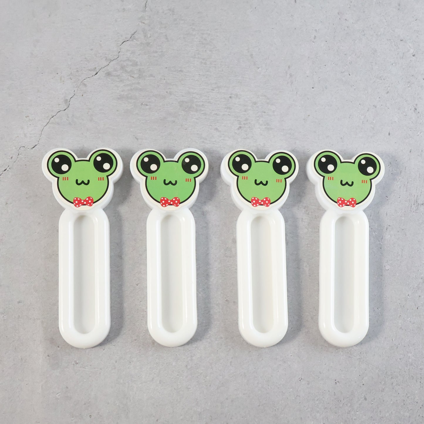 Set of four Wukusy self-stick push pull helper tools for easy door and drawer operation in home and kitchen use.