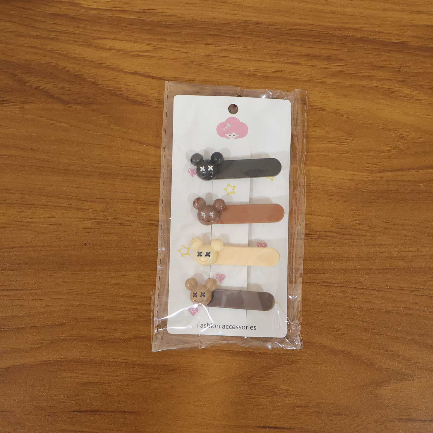 Set of four Wukusy cute cartoon bear design premium fashion hair clips, featuring playful bear faces for kids' hairstyles.