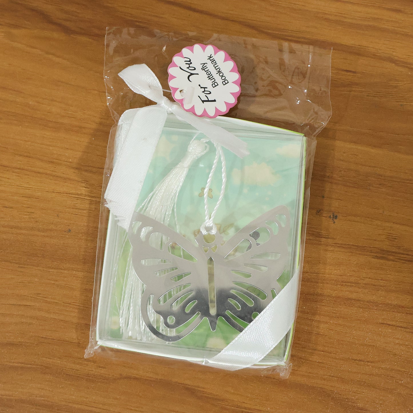 Metal bookmark with an elegant butterfly design by Wukusy, featuring intricate details and a sleek finish.