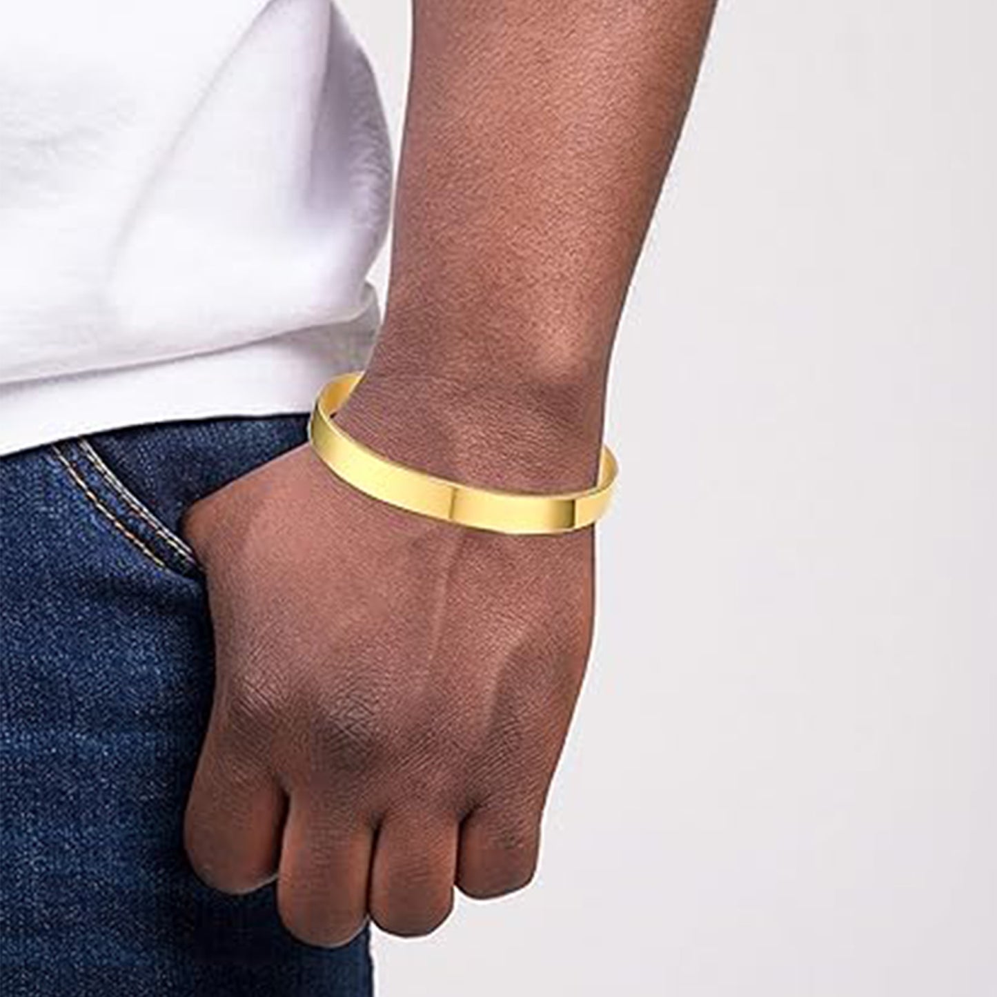 Elegant gold finish open cuff bracelet from Wukusy, featuring a sleek and stylish fashion accessory design.