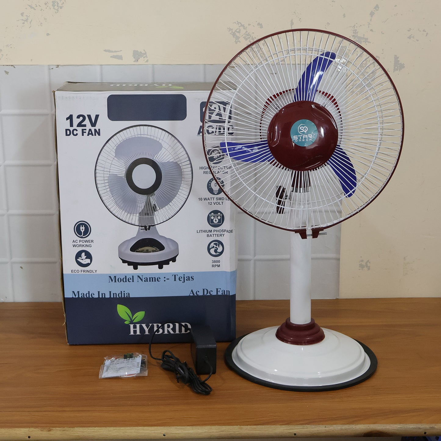 Wukusy Omega 12V rechargeable pedestal fan with LED light, showing adjustable fan head and modern design.
