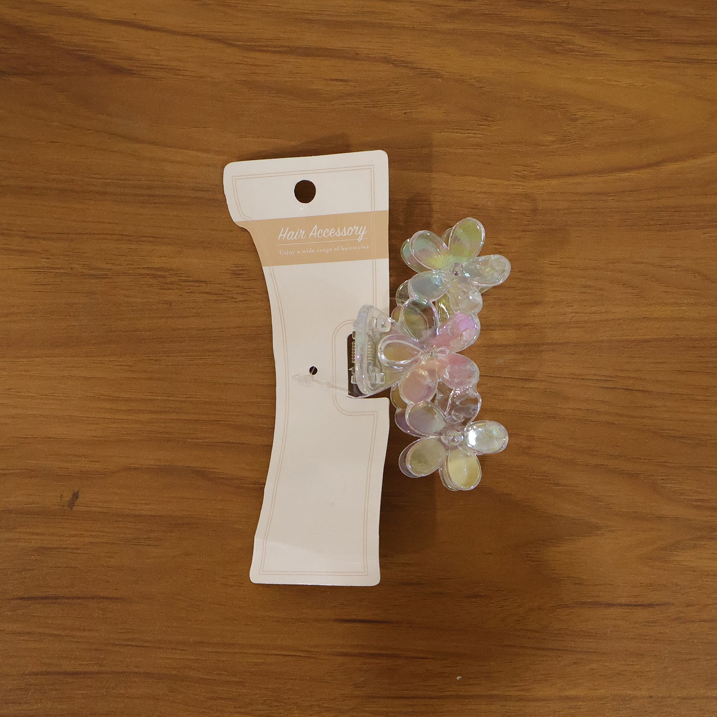 Elegant transparent floral hair claw clip by Wukusy, showcasing a delicate design with floral accents on clear plastic.