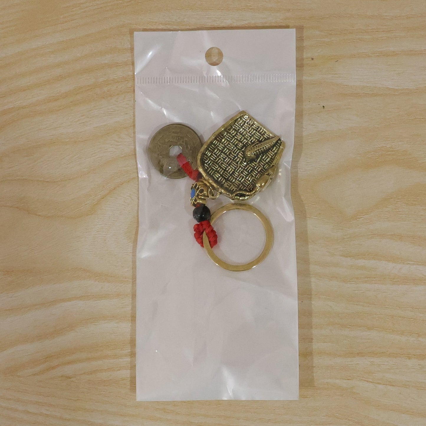 Copper plated dustpan pendant keychain with lucky coin bag charm, Feng Shui lucky charm by Wukusy, decorative accessory.