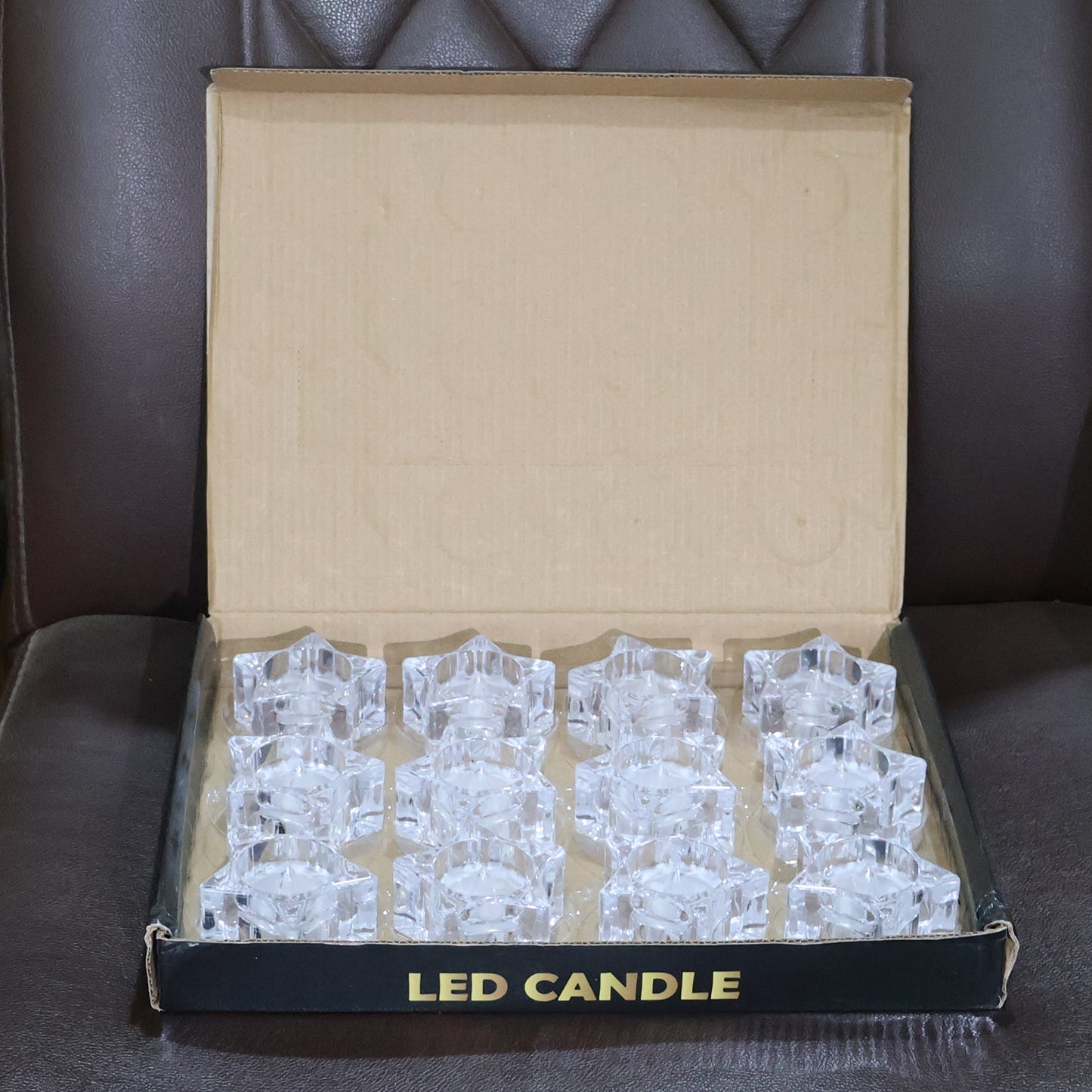 Set of 12 Wukusy LED crystal-effect flameless smokeless candles for home decor, featuring realistic flickering flame design.
