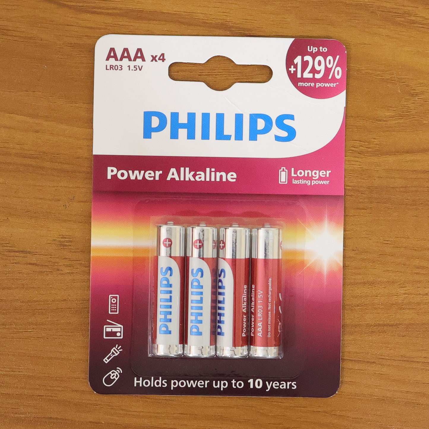 Wukusy AAA alkaline batteries pack with four batteries, showing the batteries with silver and black design on a white background.