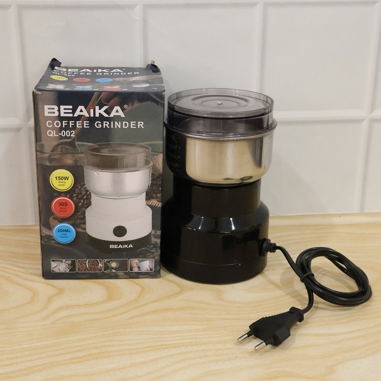 Wukusy electric coffee grinder with stainless steel blades, compact spice grinder machine showing metallic finish and grinding jar