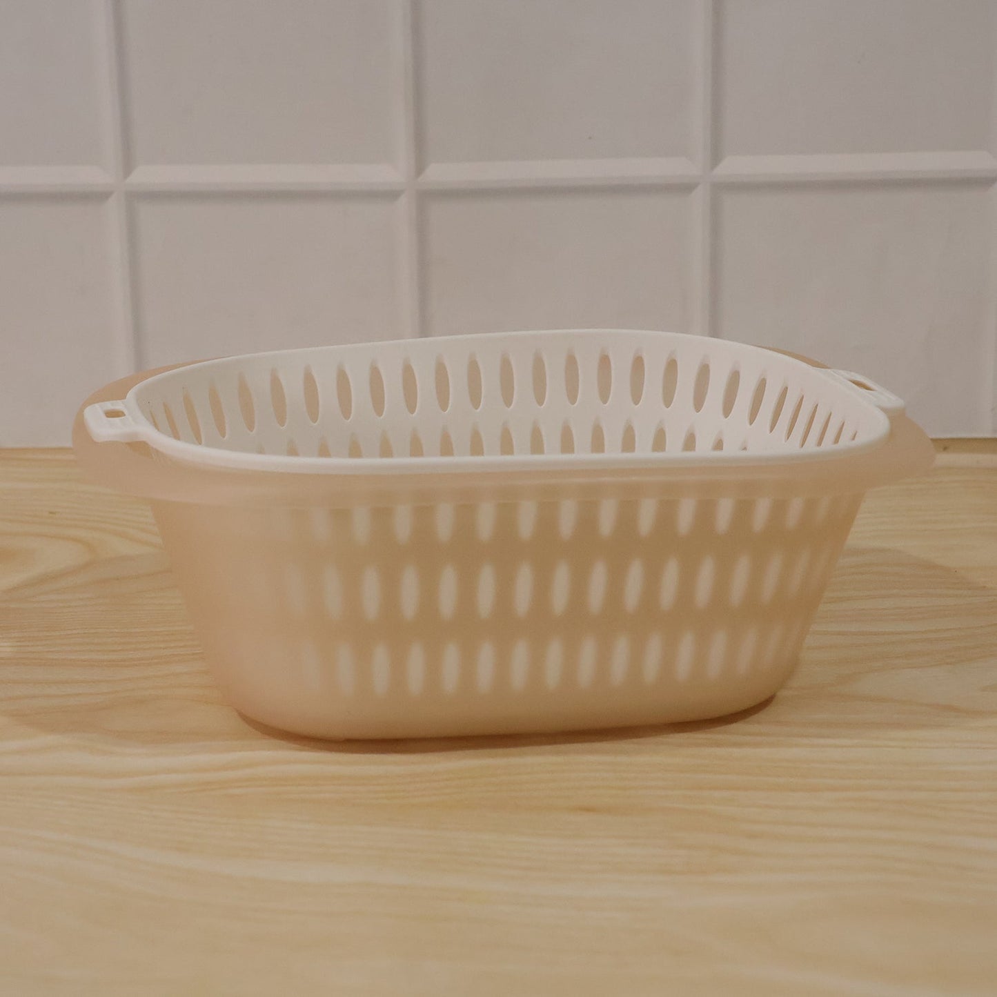 Wukusy 2-in-1 plastic double drain basket and colander set with washing bowl, ideal for rinsing and draining vegetables.