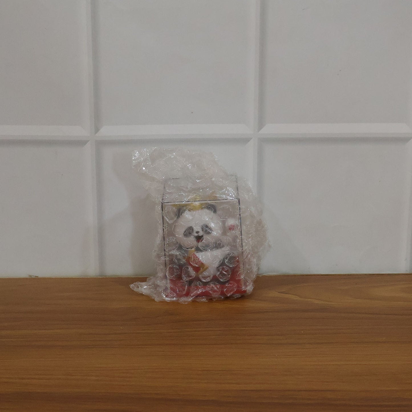 Solar powered moving hand panda showpiece by Wukusy, featuring a cute panda with a hand that moves when exposed to sunlight.