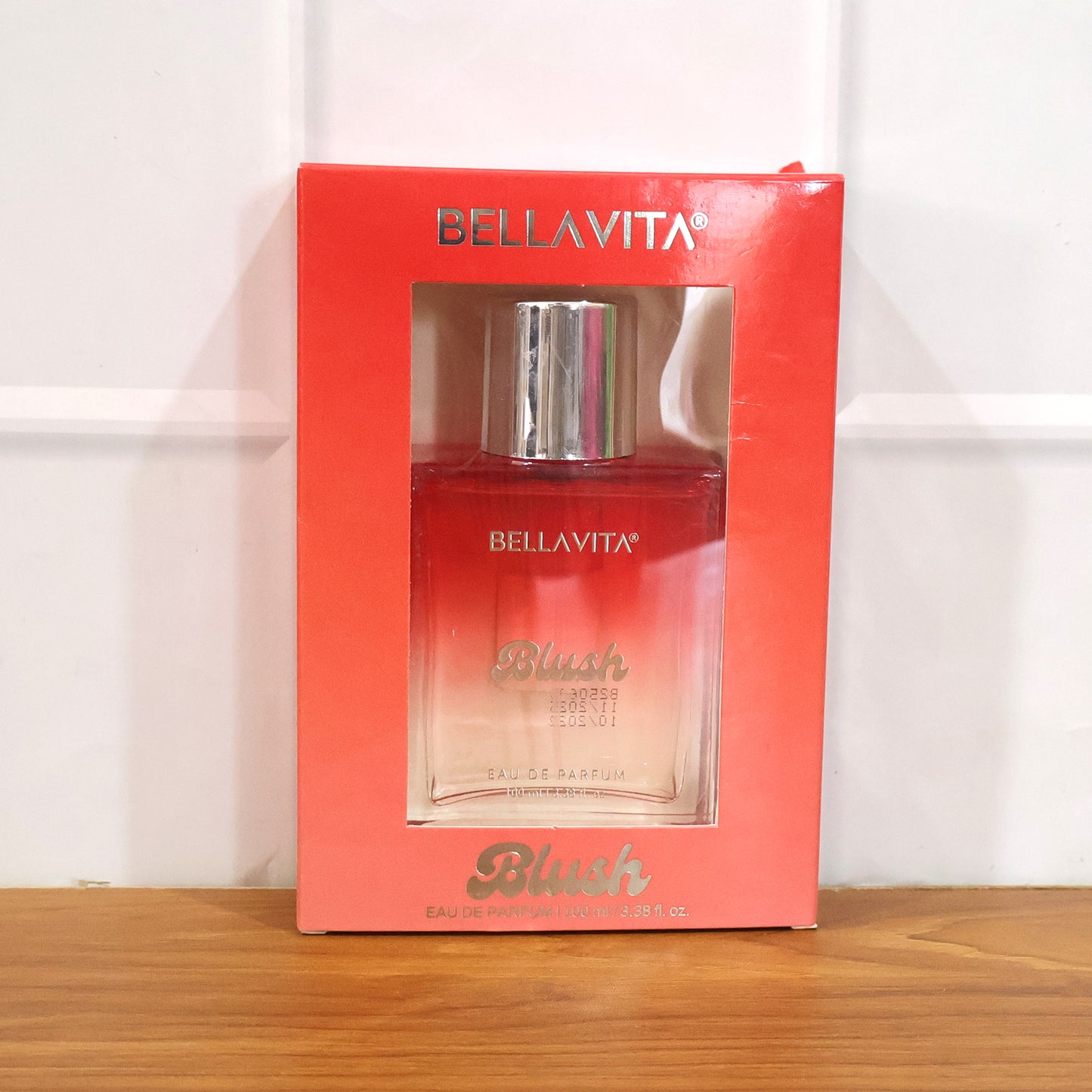 Wukusy Bellavita Premium Blush Eau De Perfume 100ml bottle with elegant pink floral design on the box