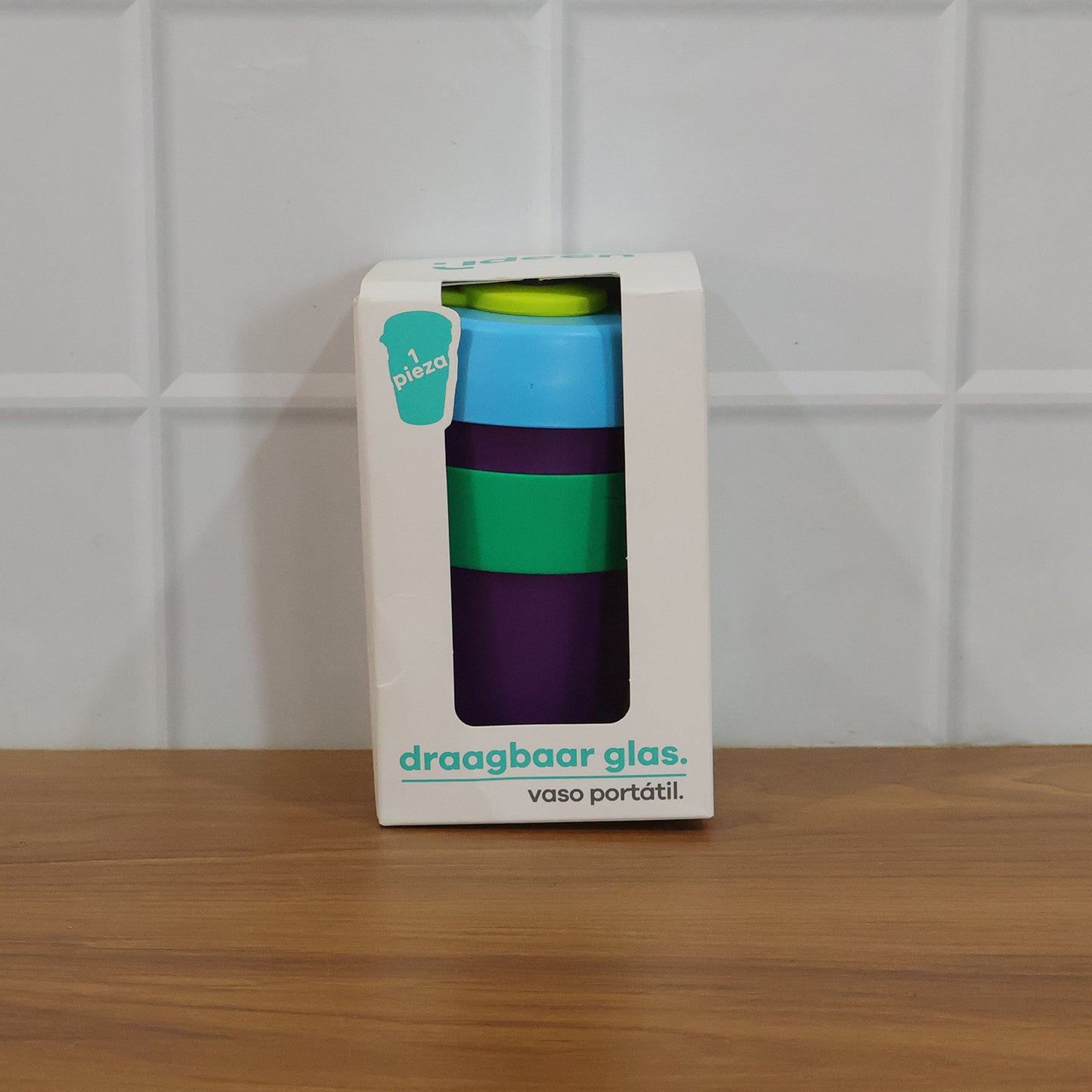 Colorful reusable travel mug with secure silicone lid, 400 ml capacity, by Wukusy, shown with vibrant design and leak-proof lid.