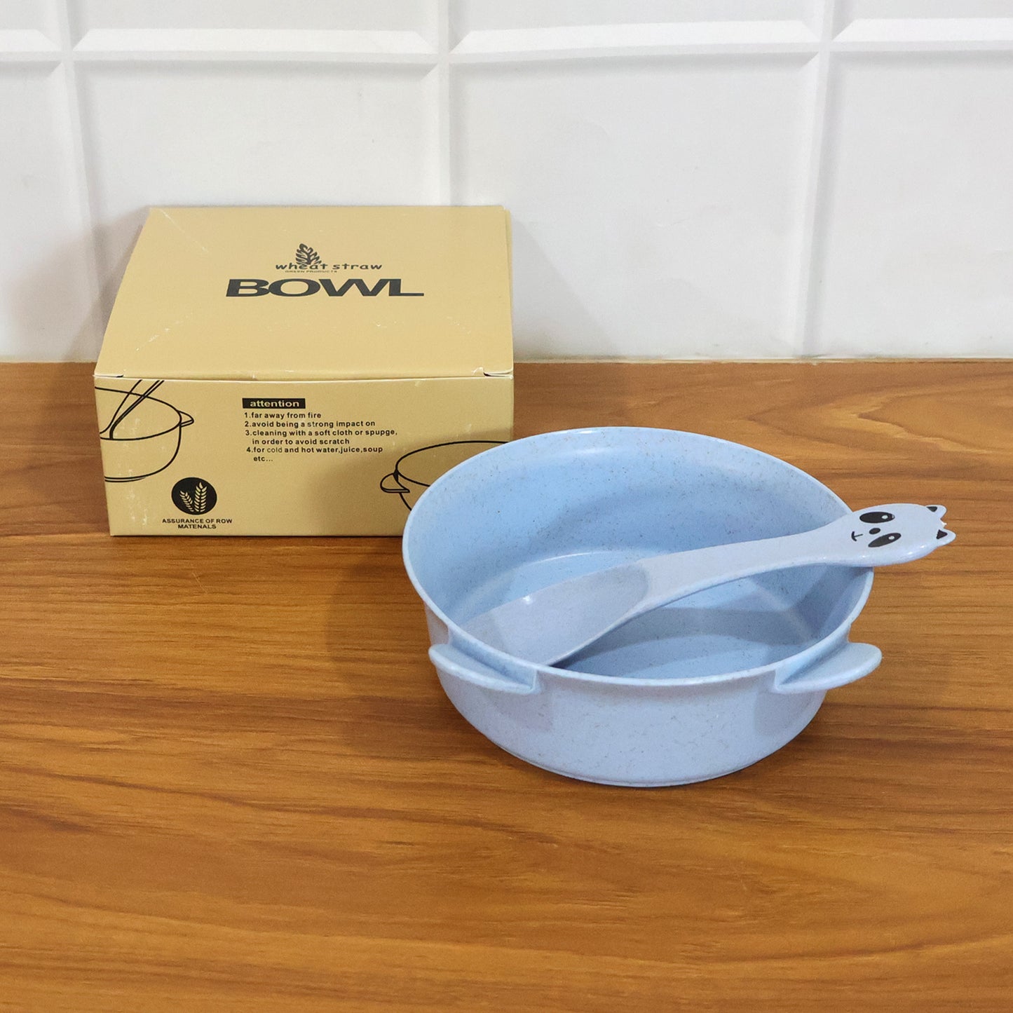 Wukusy wheat straw kids soup bowl with matching spoon, 240ml, durable and eco-friendly, shown with a colorful spoon and bowl.
