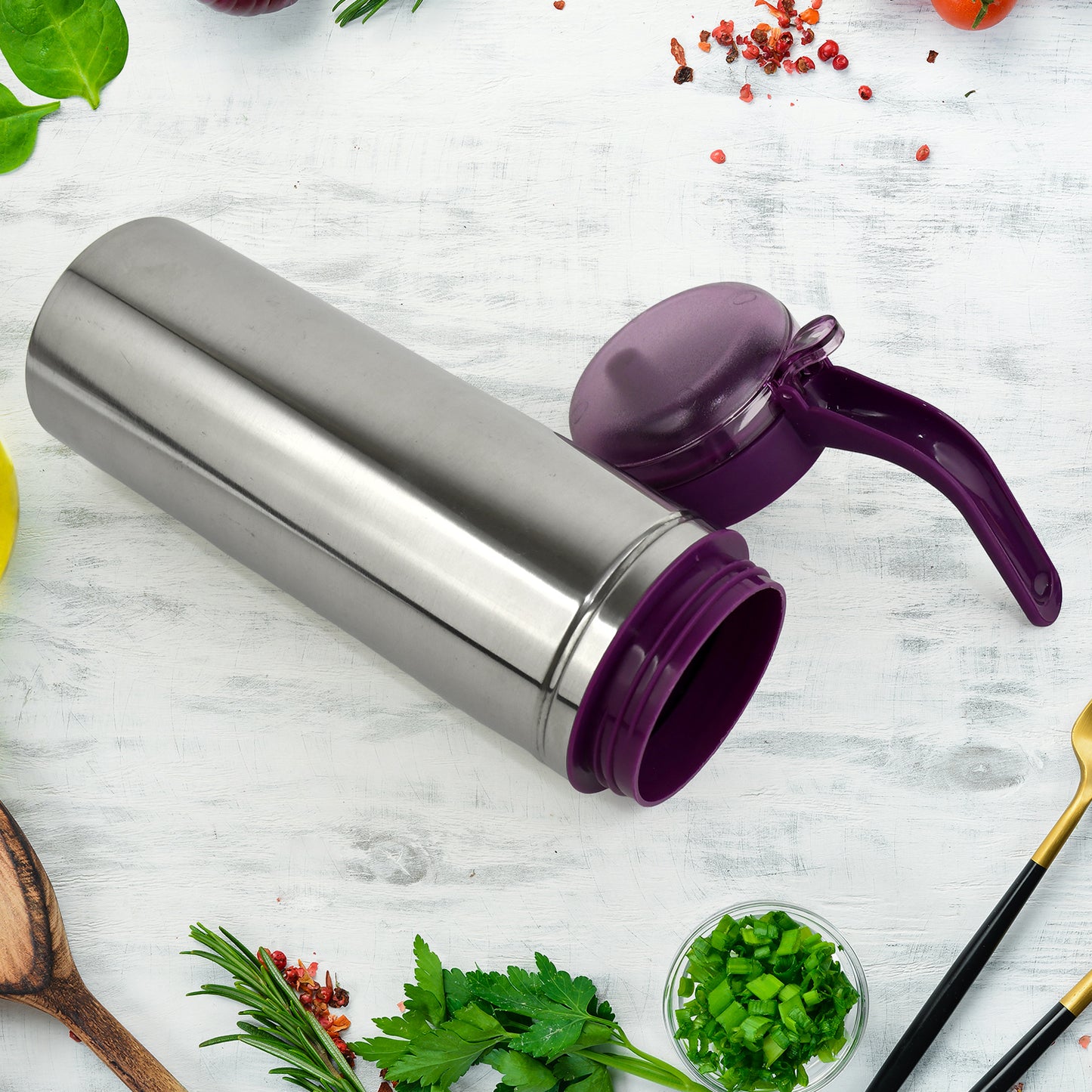 Wukusy Apex 750ml stainless steel oil pourer for kitchen use, with a sleek, durable design for easy oil dispensing.