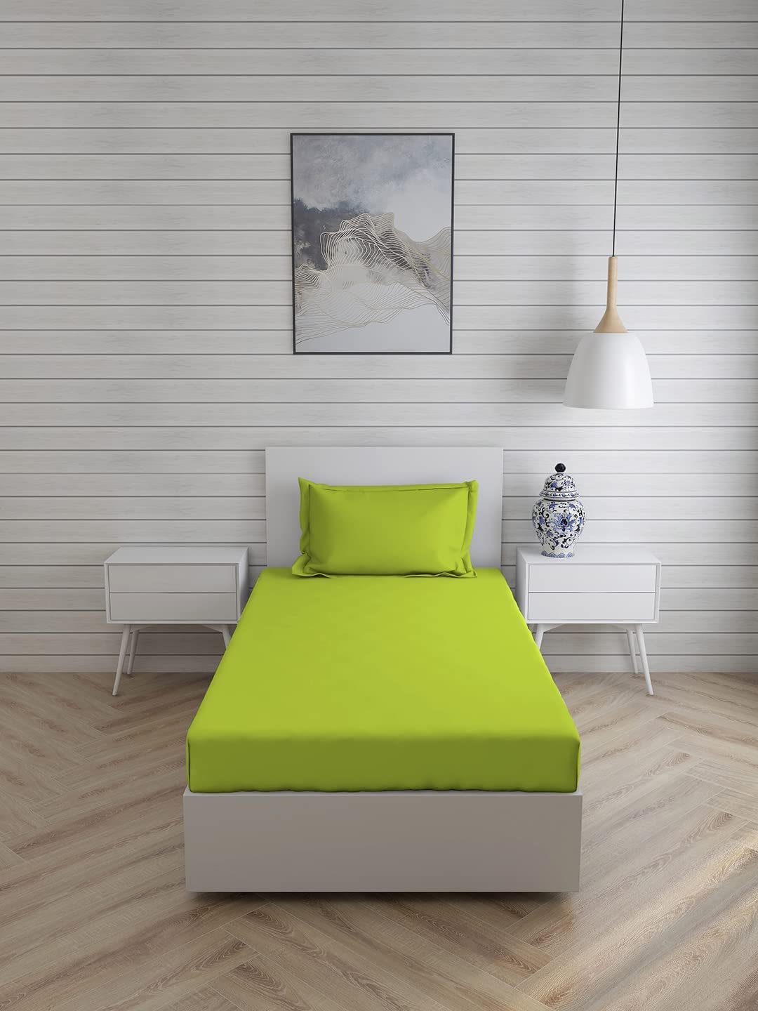 Neon-colored plain bedsheet for single bed with one pillow cover, made by FIZZI SHOP, featuring vibrant, smooth fabric.