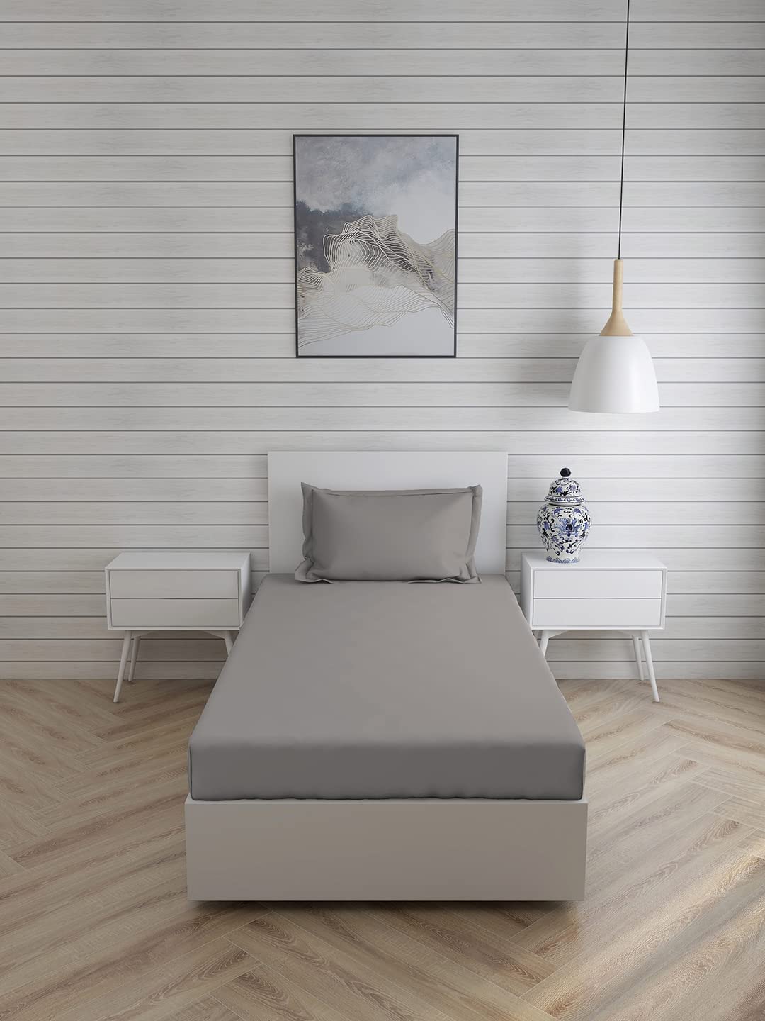 Grey Seasons plain bedsheet for single bed with one pillow cover, by FIZZI SHOP, showing smooth fabric and neat edges.