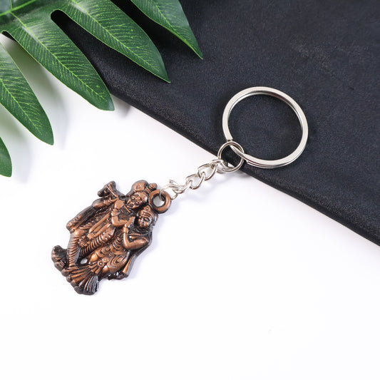 Wukusy Radha Krishna metal keychain set with two mix design keychains featuring religious iconography and intricate detailing.