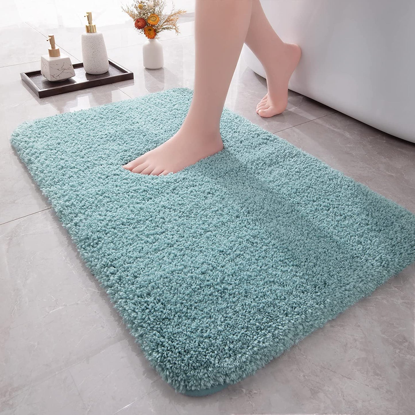 Sky blue microfiber anti-slip bathmat set by Seasons, featuring textured surface and non-slip backing for safety and comfort.