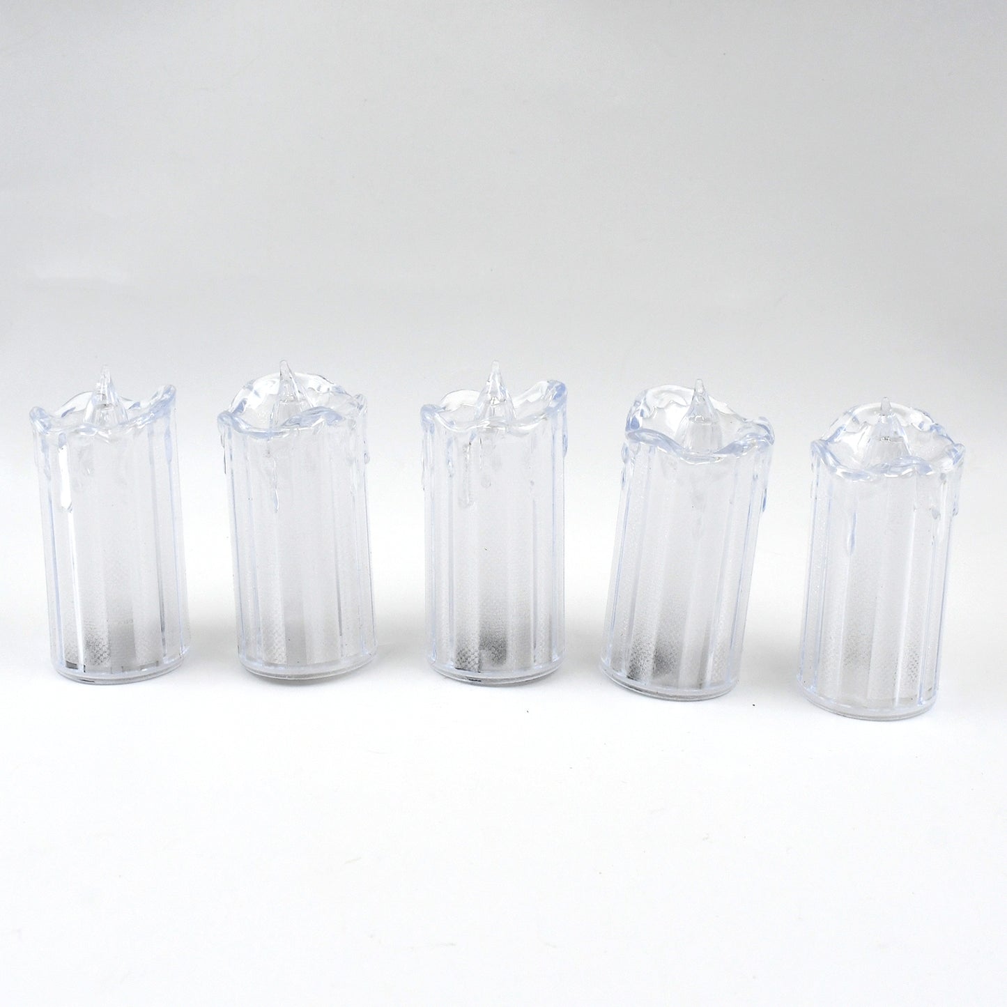 Wukusy 24-piece flameless LED tea light candles with flickering, smokeless design for home decor ambiance, arranged in a decorative display.