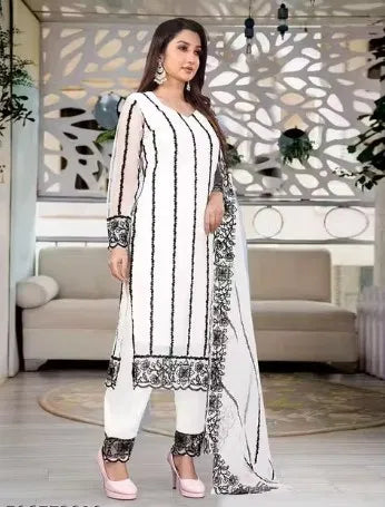 Womens kurta set with matching dupatta and bottomwear, featuring intricate embroidery and vibrant colors, by 15801.