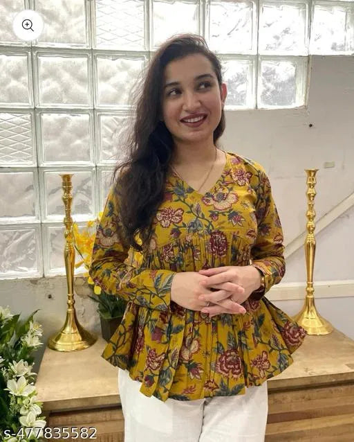 Stylish mustard floral vibe empire top for women, comfortable daily wear kurtis with intricate floral print and relaxed fit.